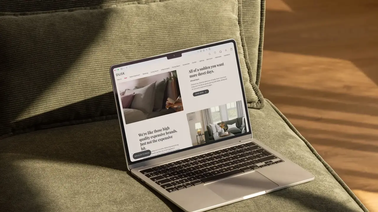 a laptop on a couch