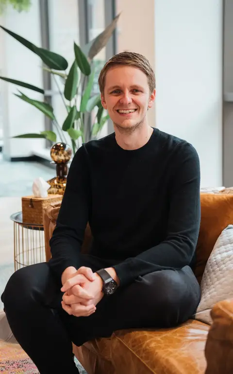 a man sitting on a couch